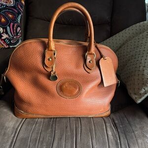 Dooney & Bourke Tan Leather Travel Bag